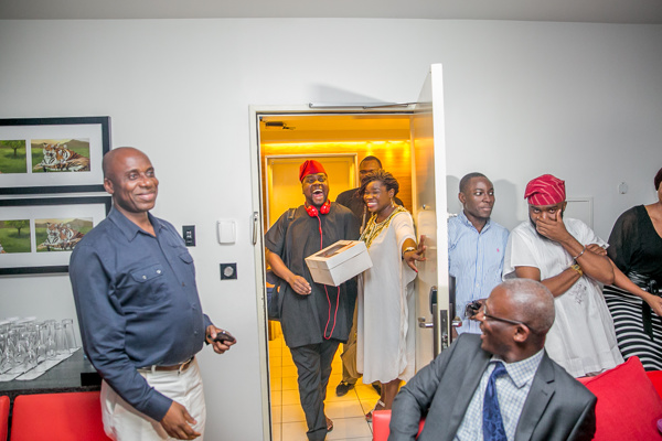 Adebola Arrives to a room full of friends and family